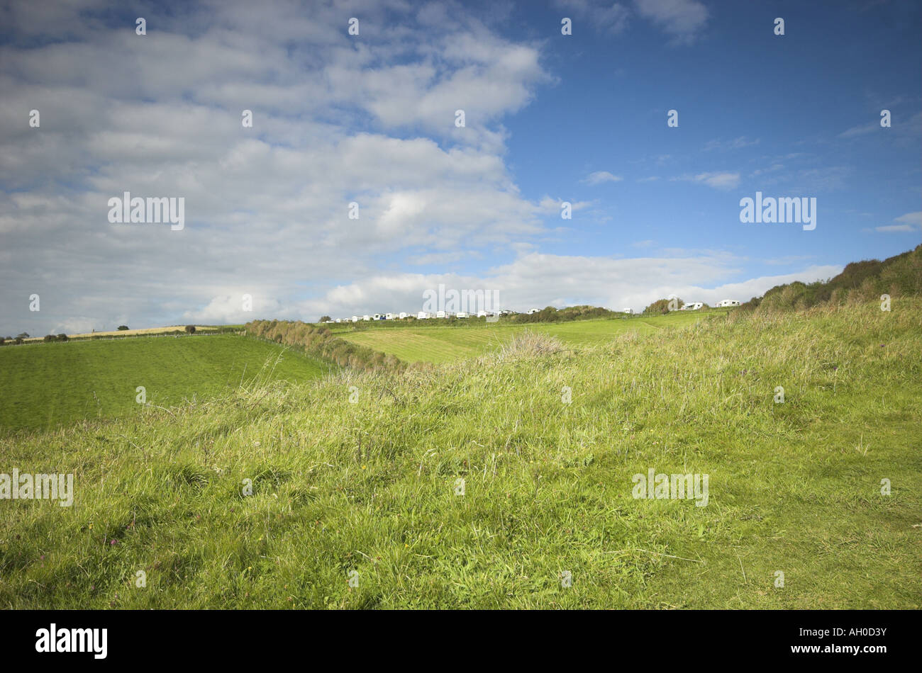 a wide view of a landscape from a cliff top in dorset Stock Photo