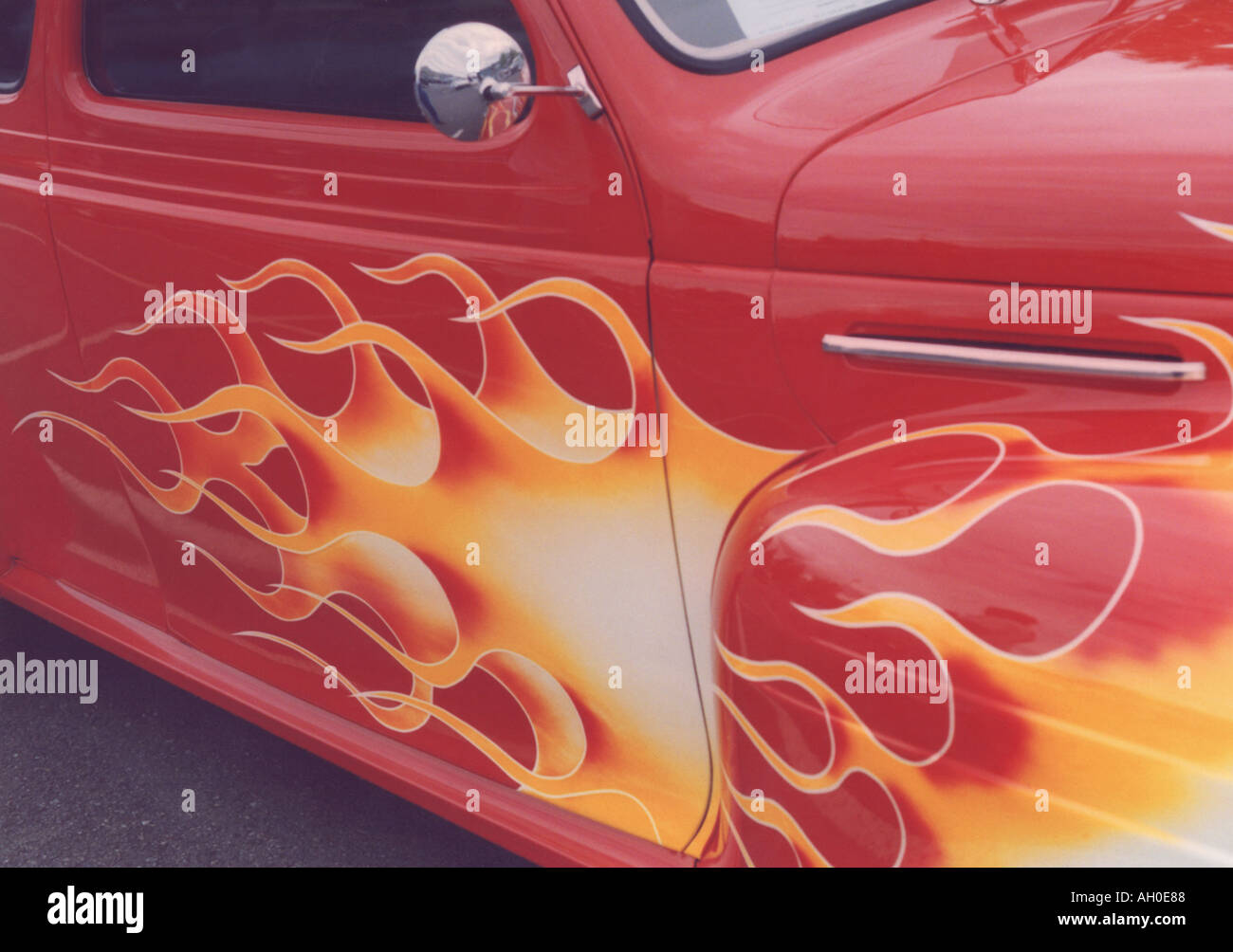 1947 Chevy Coupe with flame graphics on the side panel. Stock Photo