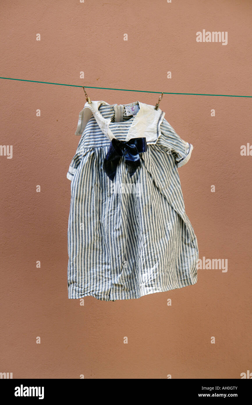 Children clothes on linen line Stock Photo Alamy
