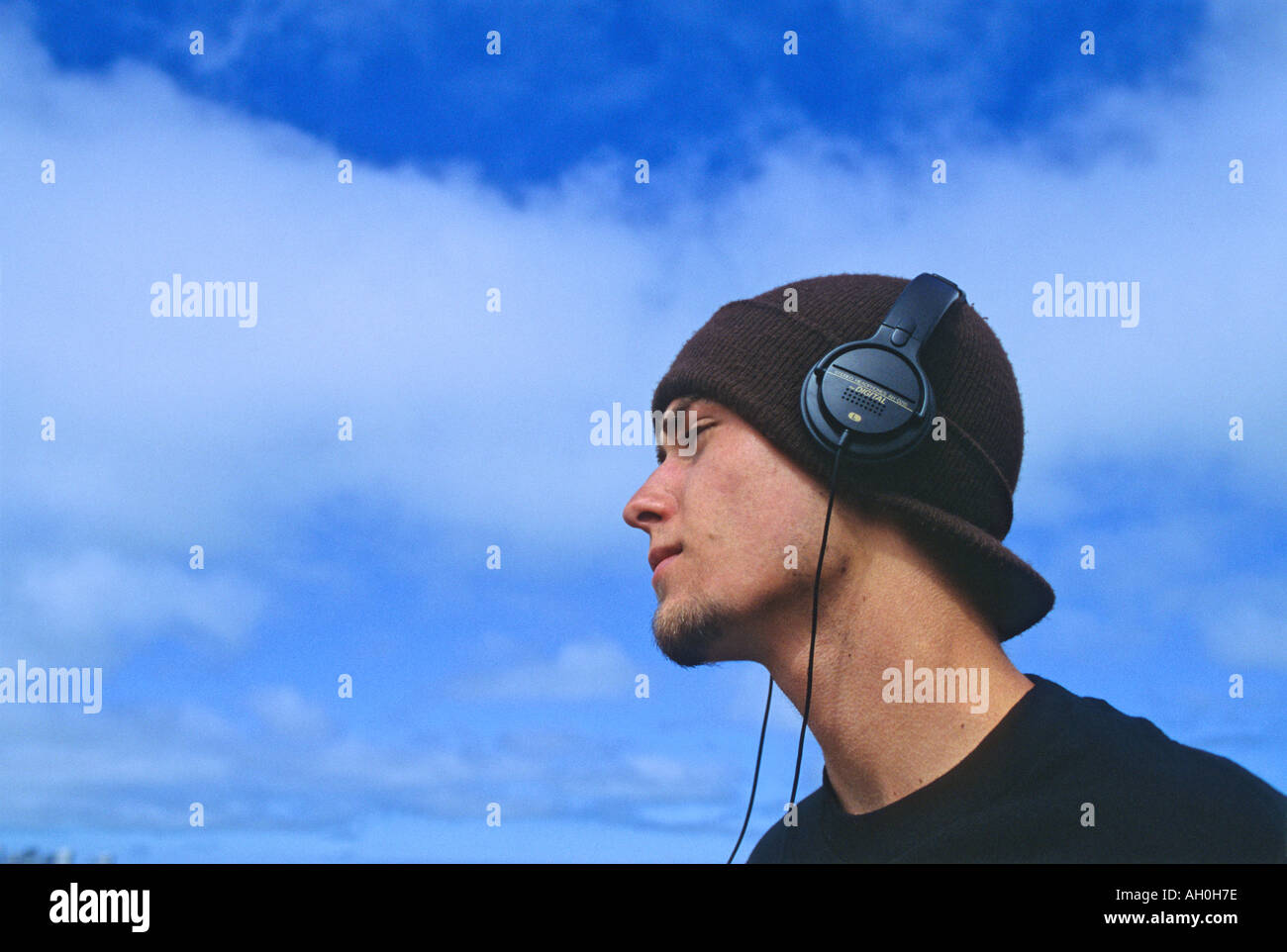 "^Young man ^wearing "wool hat" and ^headphones Stock Photo Alamy