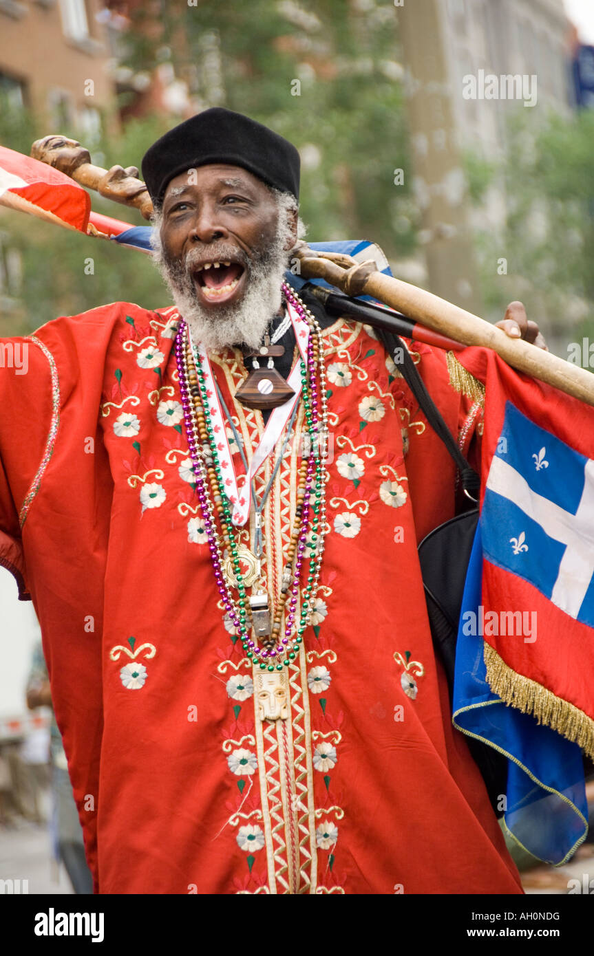 Canada Montreal Quebec Colorful costume paraders marching in the annual