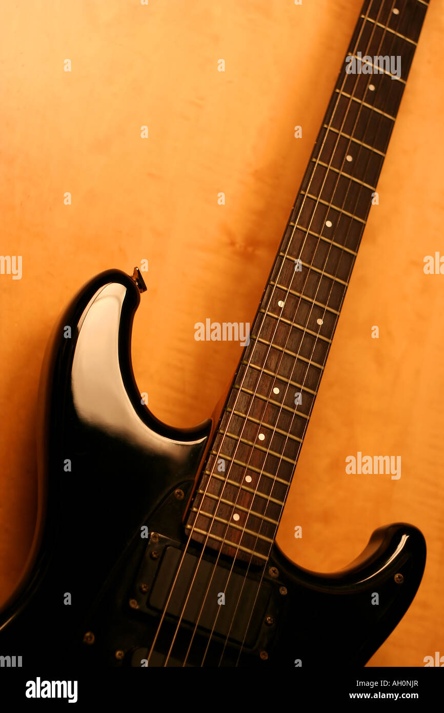 Crop of a black guitar with copy space Stock Photo Alamy