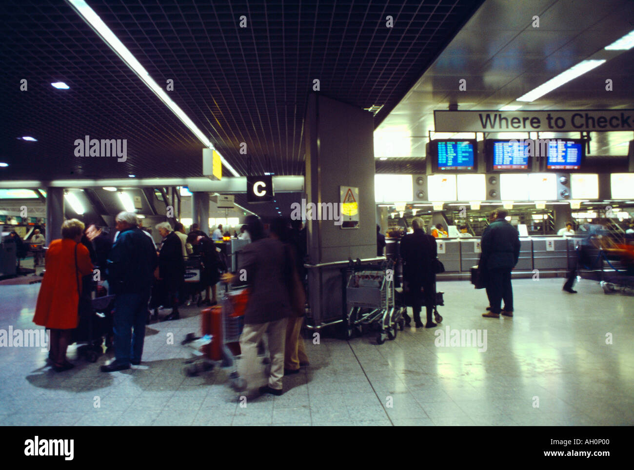 Heathrow Airport Terminal Building Check In Desks Stock Photo Alamy
