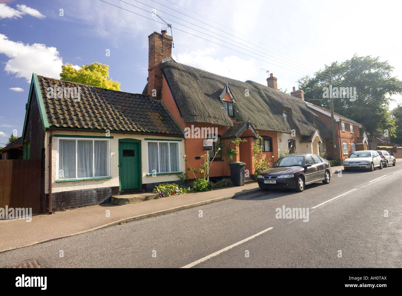 thatched roof cottages in The Street in Badwell Ash, Suffolk, UK Stock