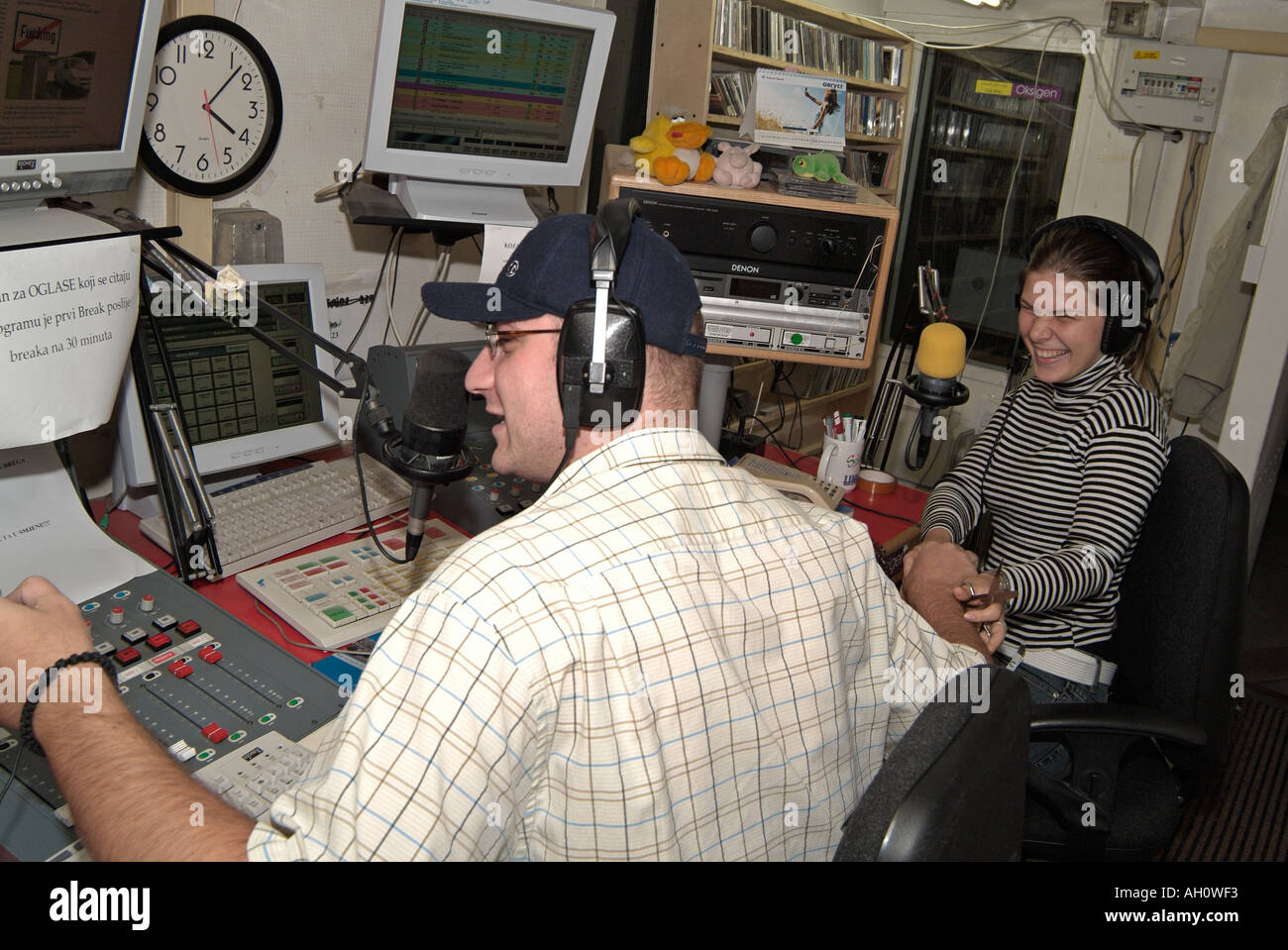 Radio DJs Presenting a Show from an On Air Studio Stock Photo 4676082