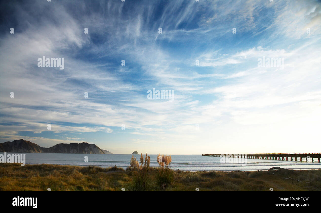 blue sky over tolaga bay and wharf Stock Photo Alamy