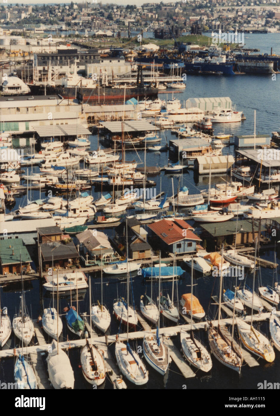 Marina with house boats on Lake Union, in Seattle, Washington with Gas Works Park in the