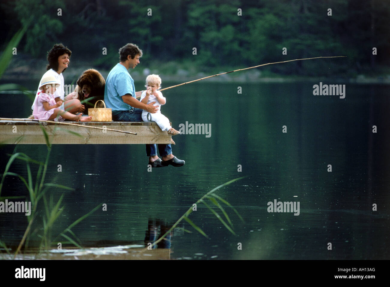 Boy with fishing pole hi-res stock photography and images - Page