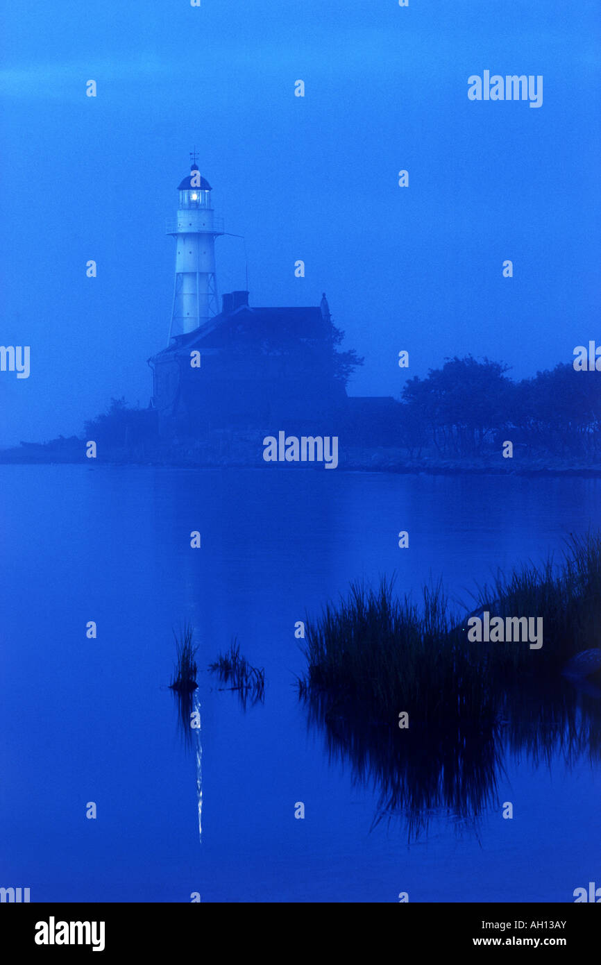 Misty morning at Högby Lighthouse along Sweden's East Coast on Baltic Sea Stock Photo