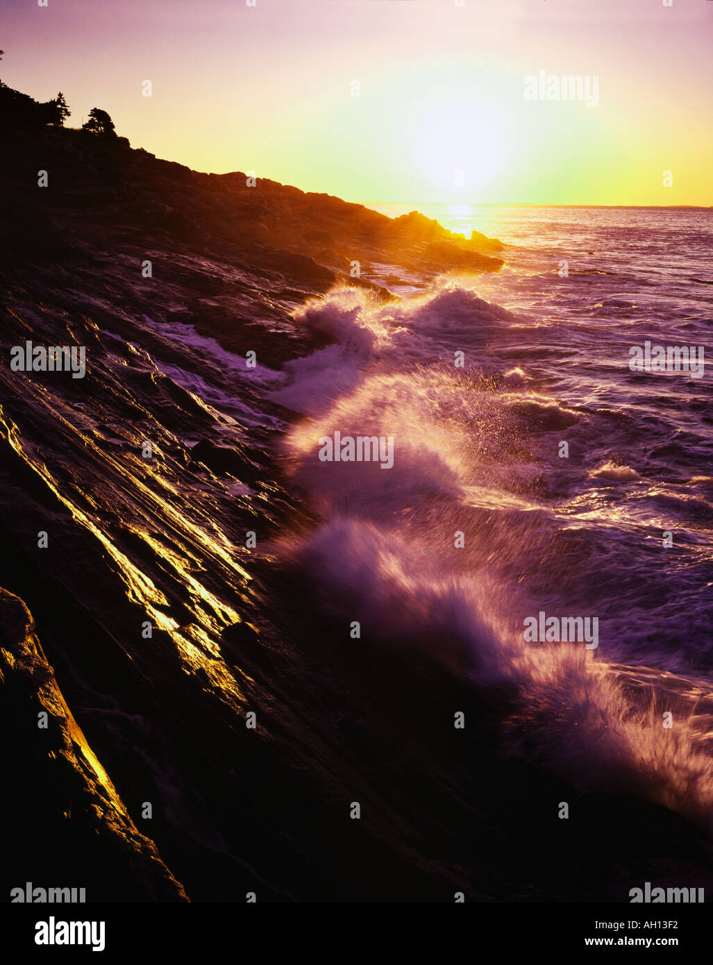 Wave hitting shore Stock Photo - Alamy