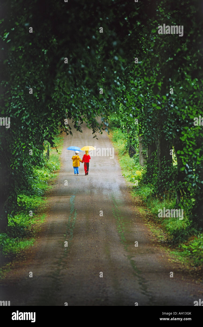 1950s BOY BEAGLE PUPPY WALKING DOWN COUNTRY ROAD WHISTLING