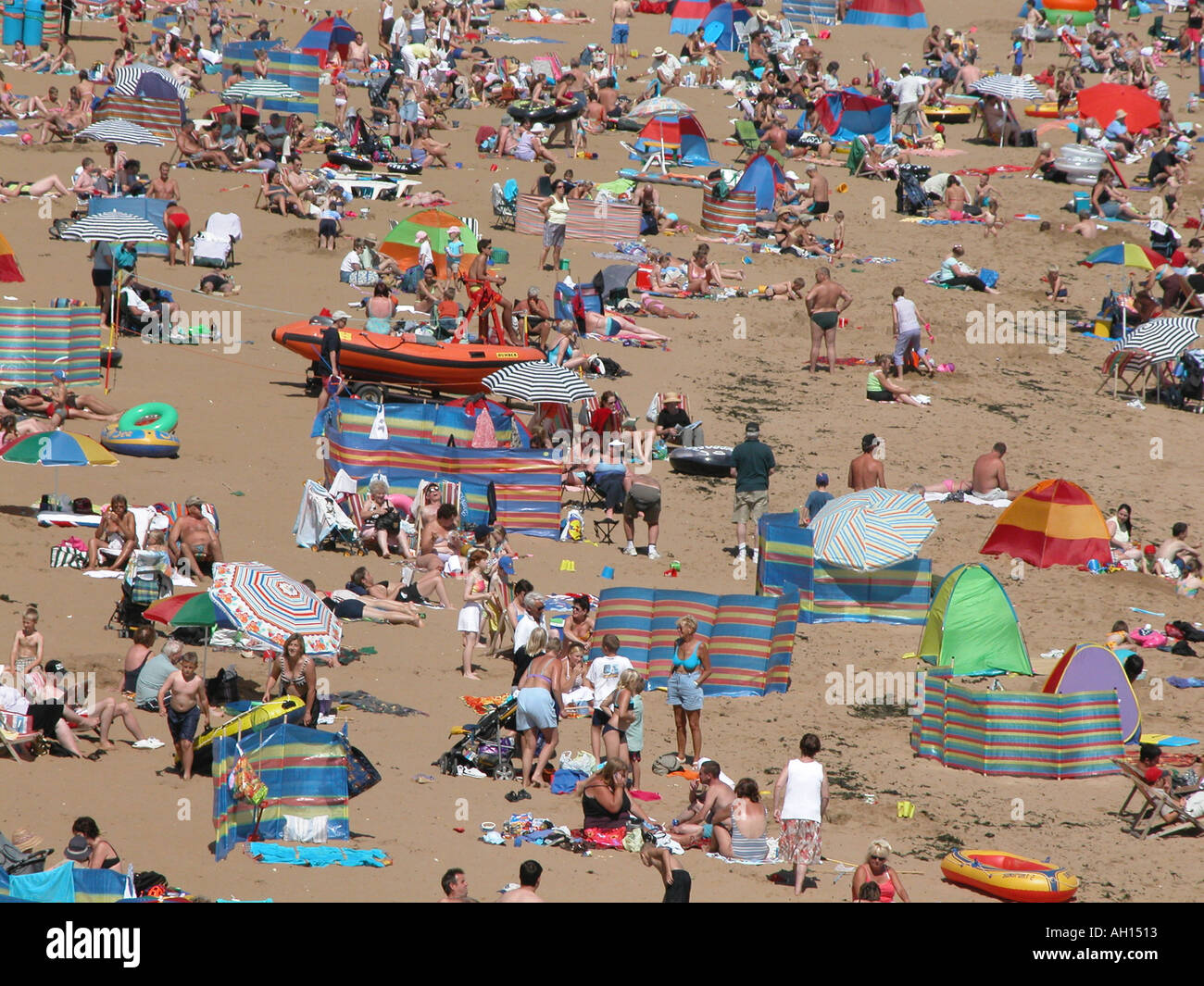 Viking Bay Broadstairs Kent England packed with people in summer Stock