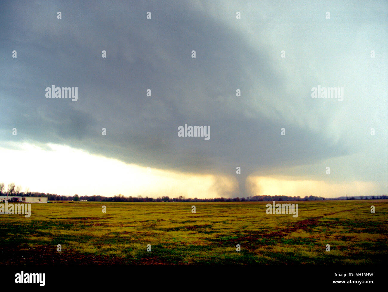 April 2, 2006 tornado outbreak. Large F3 tornado with mobile home in the foreground bears down on the city of Wynne, Arkansas. Stock Photo