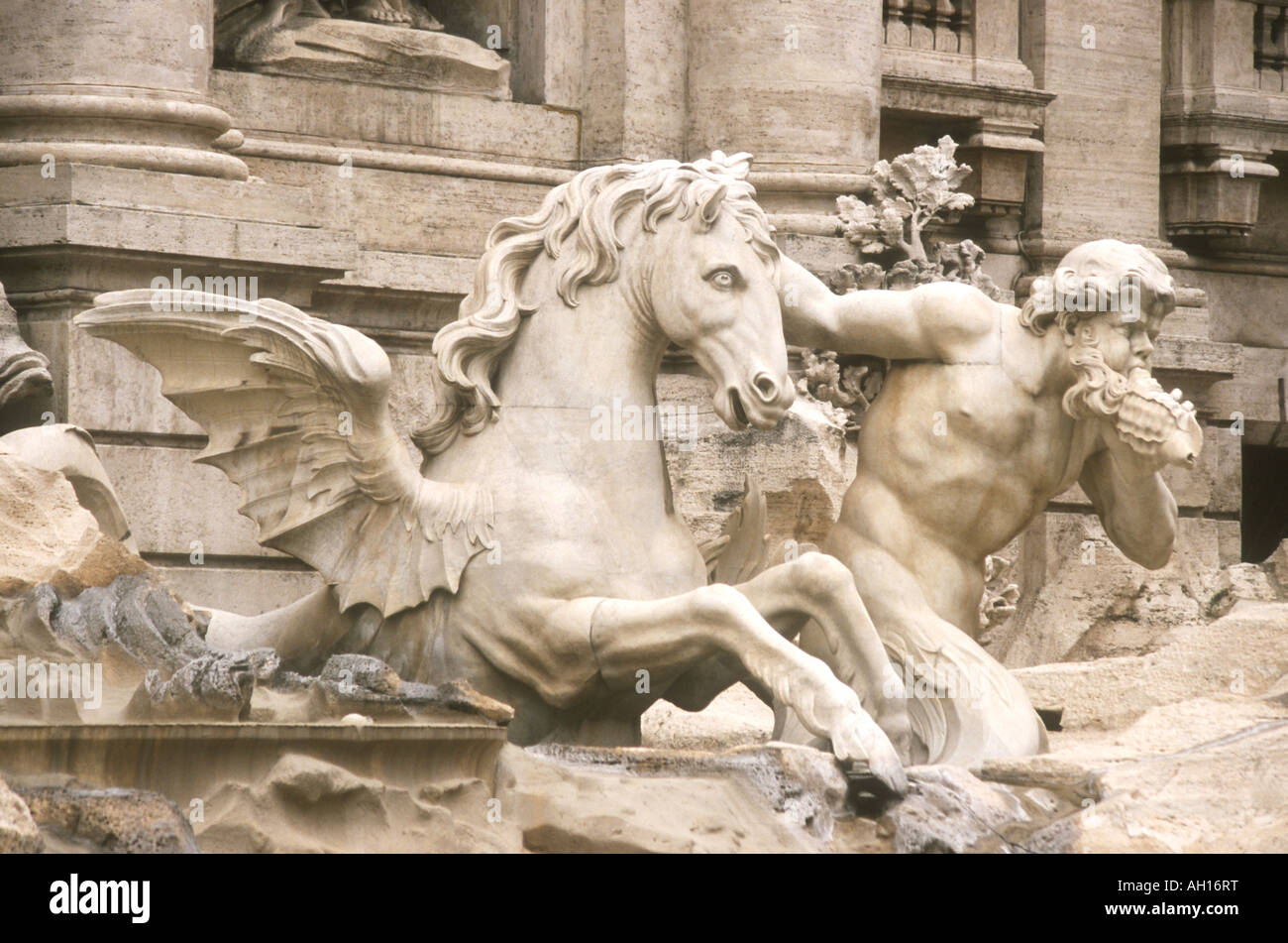 MARBLE TRITON AND SEA HORSE IN THE FAMOUS TREVI FOUNTAIN IN ROME ITALY Stock Photo