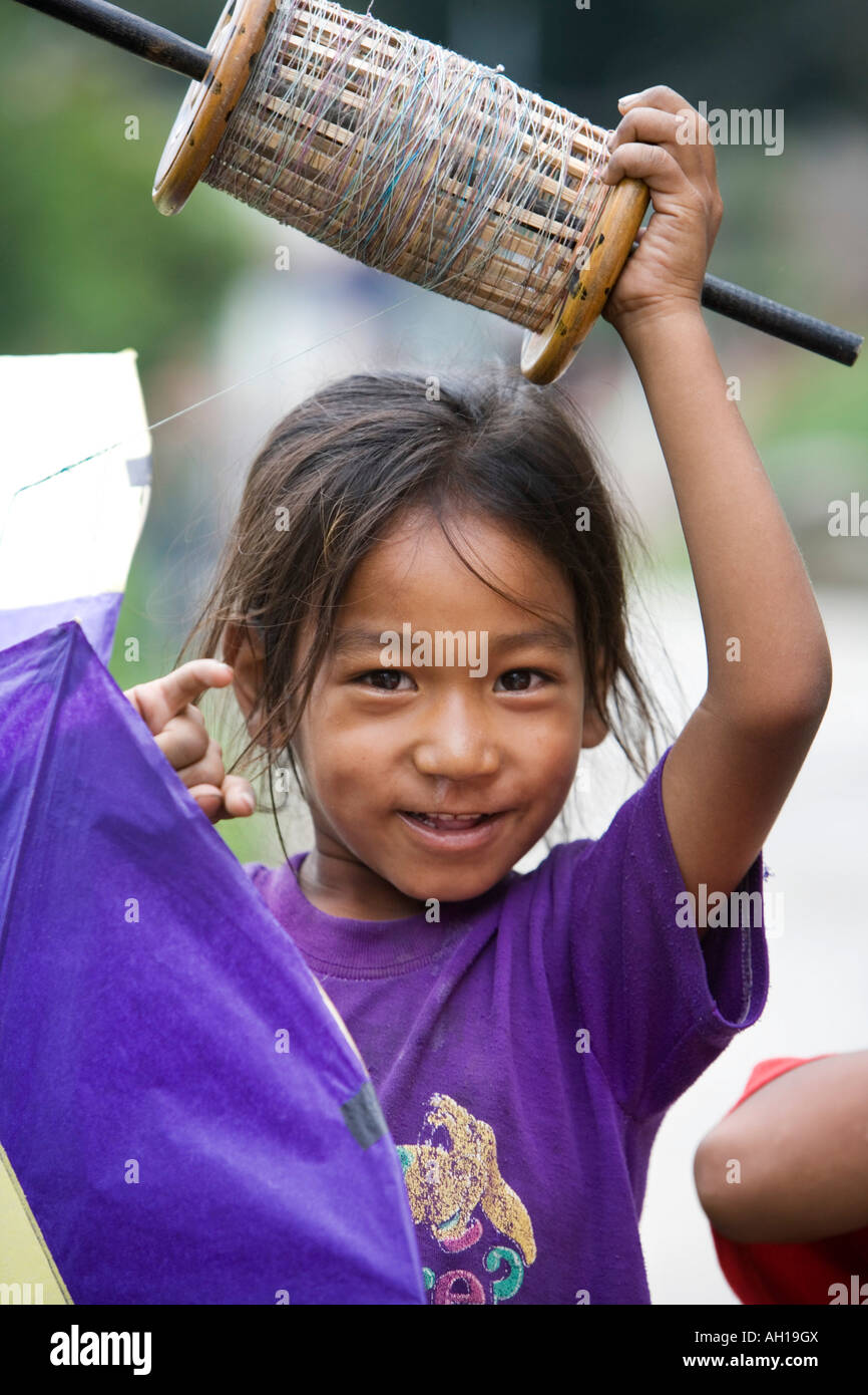 Nepali girl smiling with kite. Kathmandu, Nepal Stock Photo Alamy