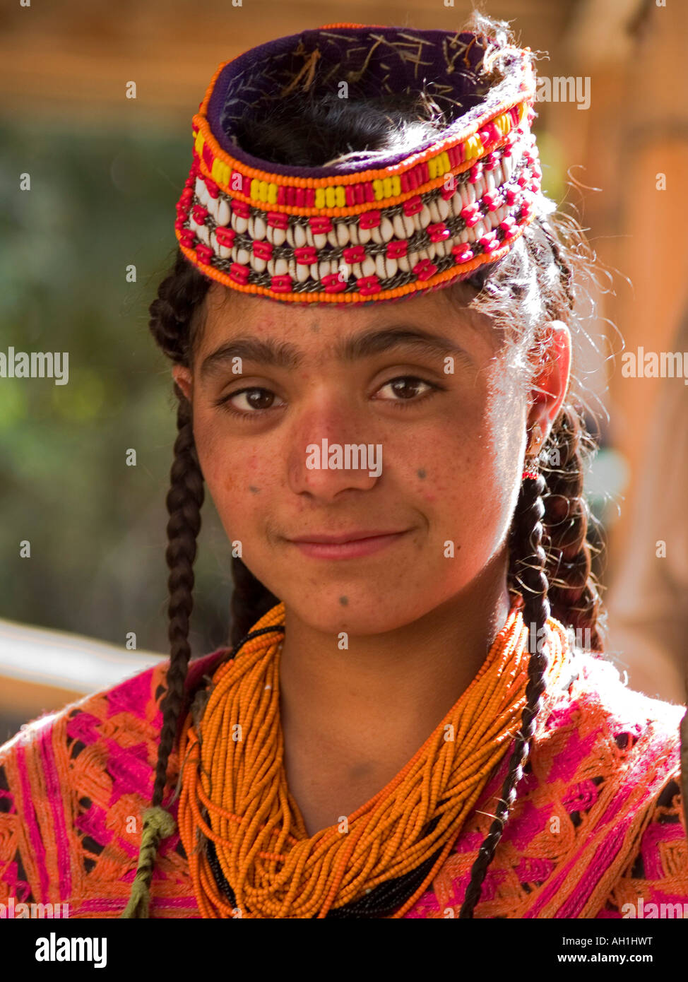 Young Kalasha woman posing Bumburet Pakistan Stock Photo - Alamy