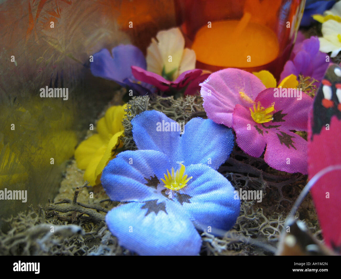 flower arrangement with blue and purple artificial flowers Stock Photo