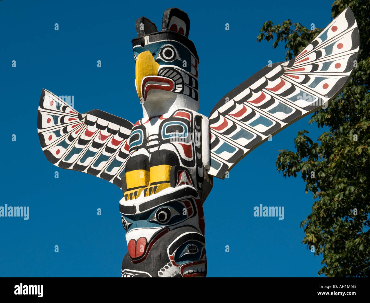 Kakaso'las Totem Pole (1955), by Ellen Neel, in Vancouver's Stanley Park, British Columbia, Canada Stock Photo