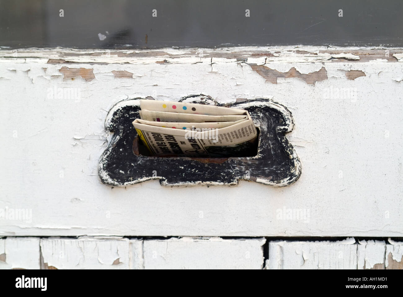 Letterbox in white painted peeling door Stock Photo Alamy