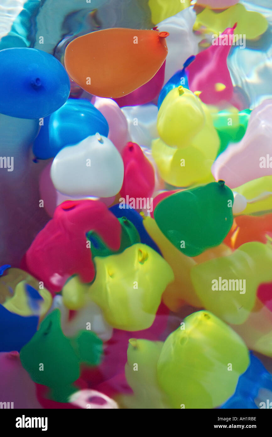 Water balloons floating in a swimming pool Stock Photo Alamy