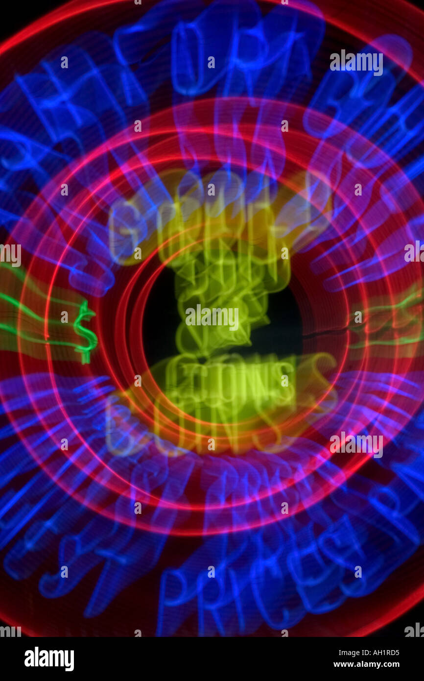 Red yellow and blue neon gold and coins sign blurred and zoomed Stock Photo