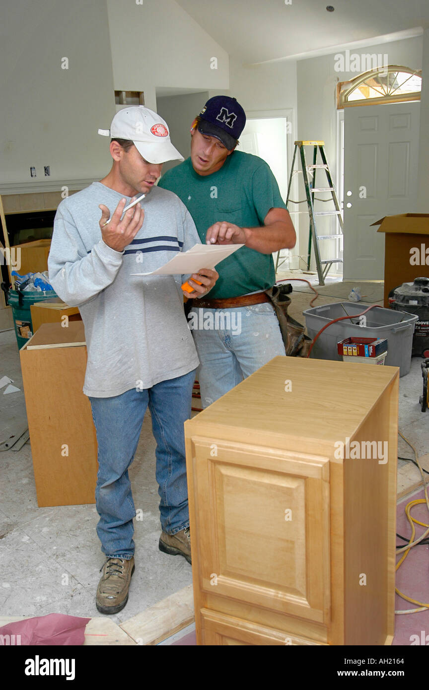 Finish Carpenters Install Kitchen in a new home house