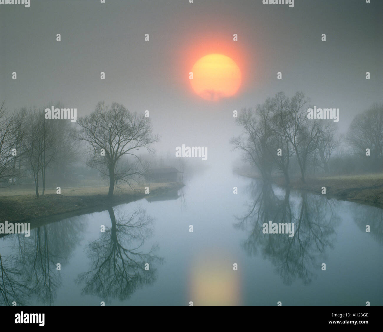 DE - BAVARIA: Sunset over River Loisach entering Lake Kochel Stock Photo