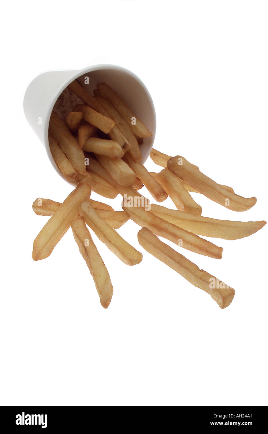 Spilled take-out cup of french fries silhouetted on white background Stock Photo