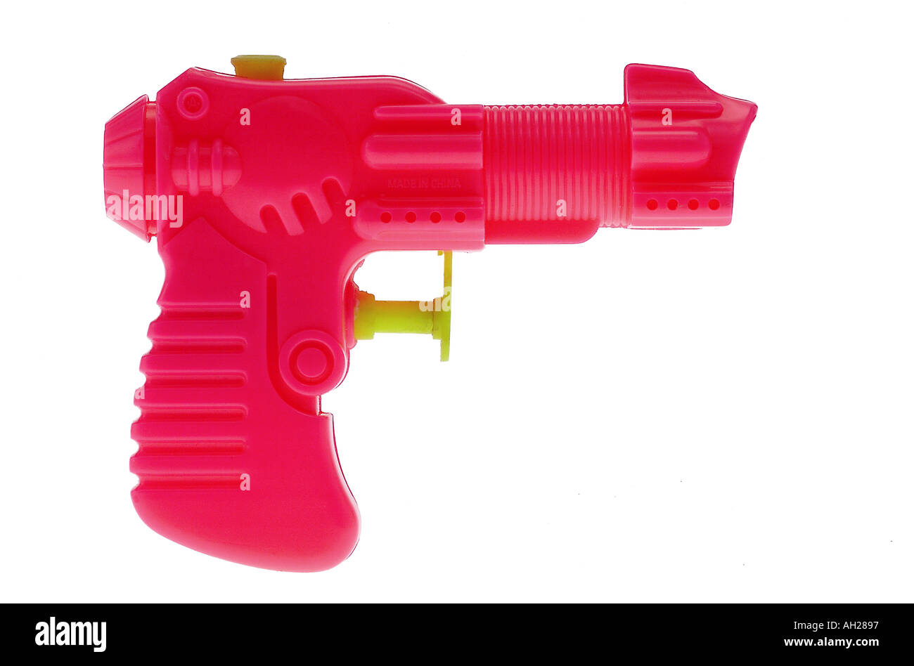 red water gun silhouetted on white background Stock Photo