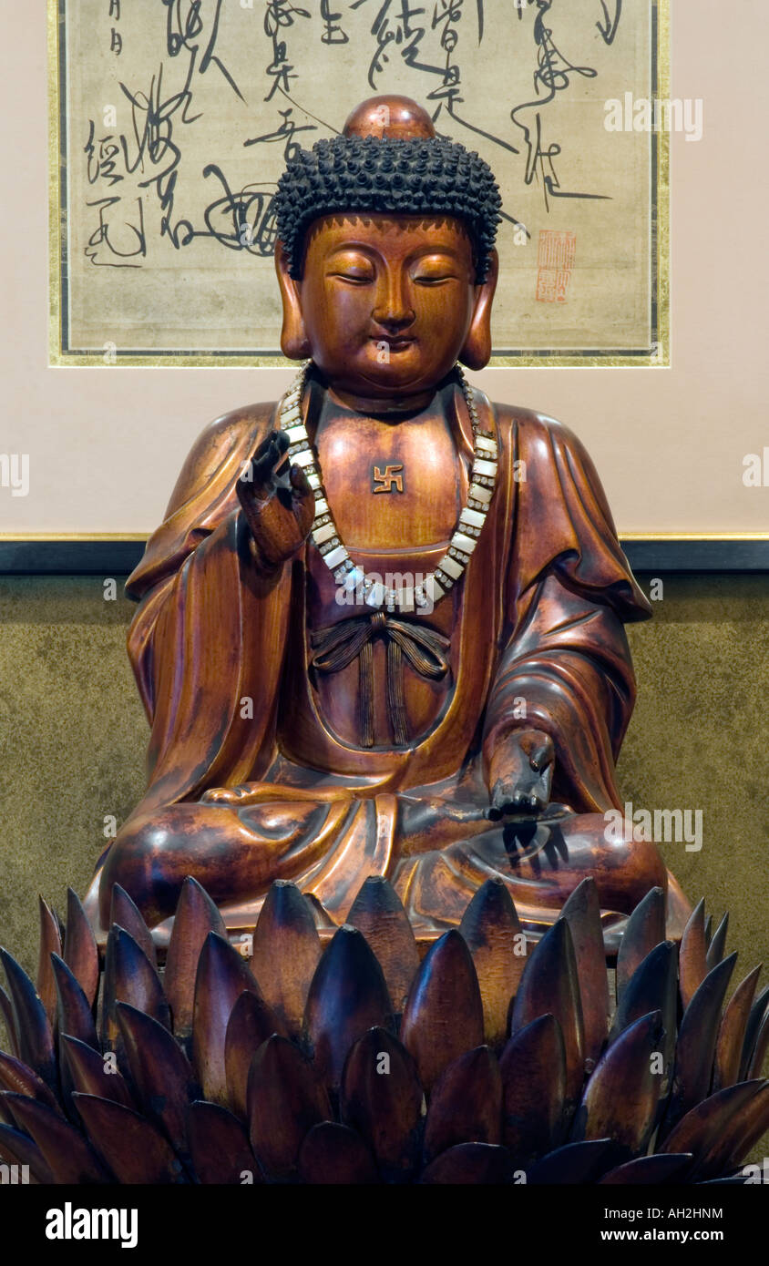 COPYRIGHT DOUG BLANE Wooden statue of Buddha Stock Photo