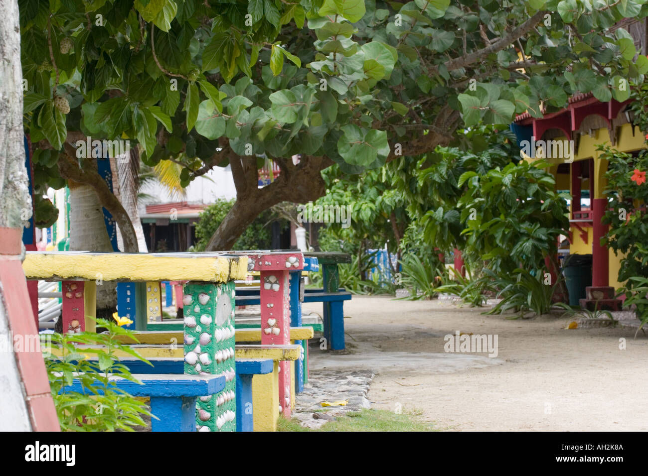 Colorful tables and benches, Isla Grande, Colon, Panama, Central America Stock Photo
