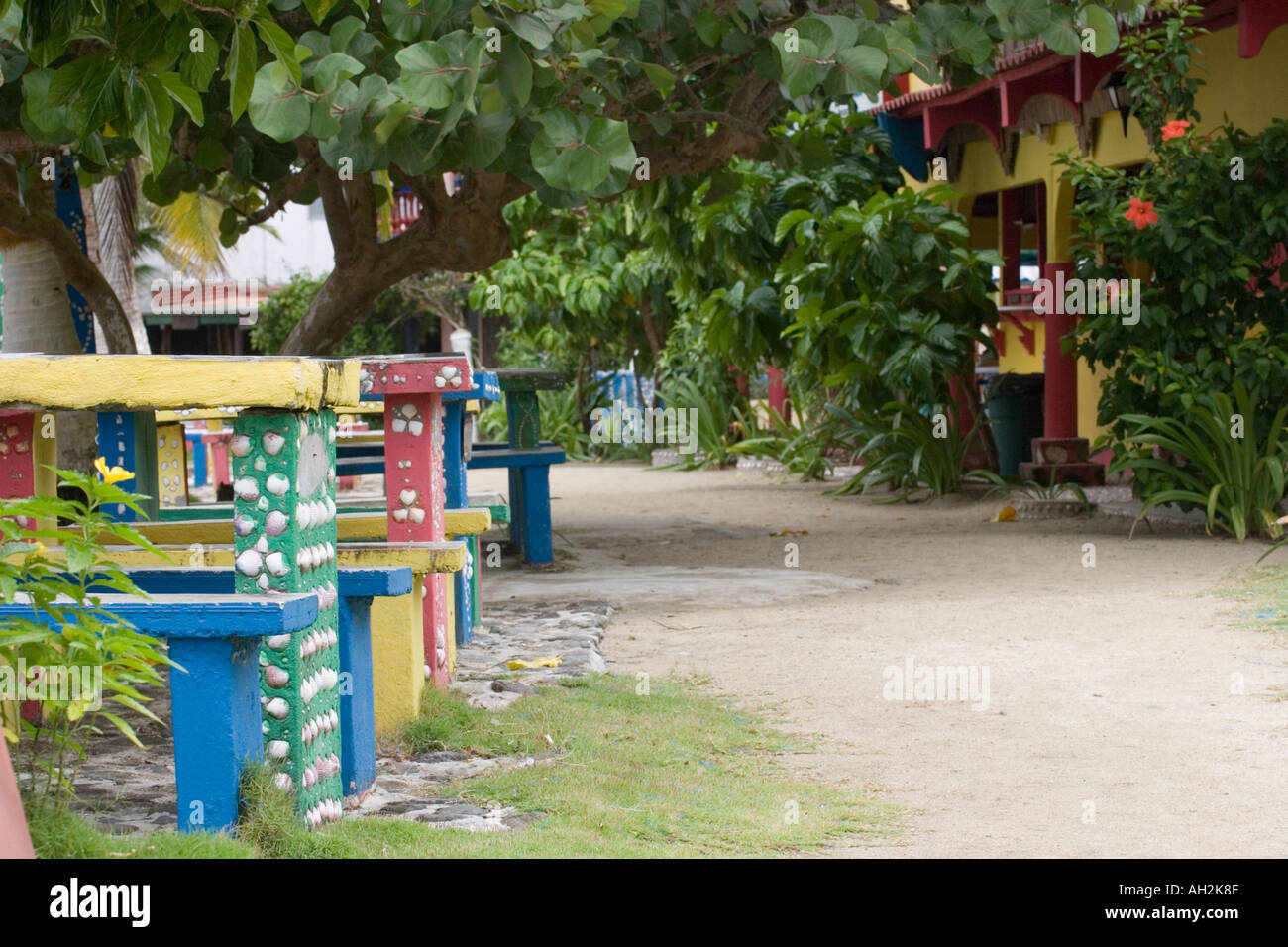 Colorful tables and benches, Isla Grande, Colon, Panama, Central America Stock Photo