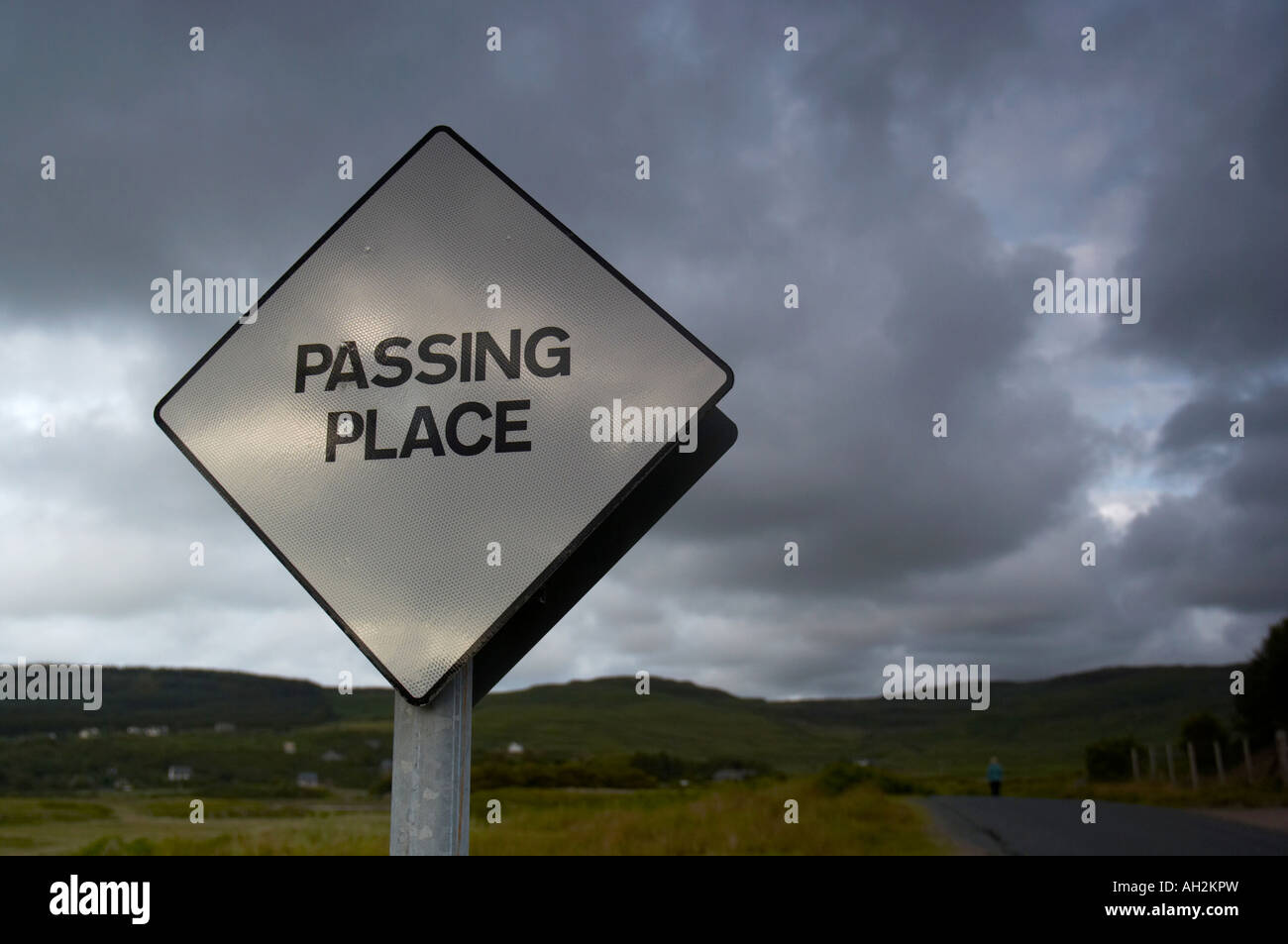 horizontal landscape photo of a passing place sign on a single track ...