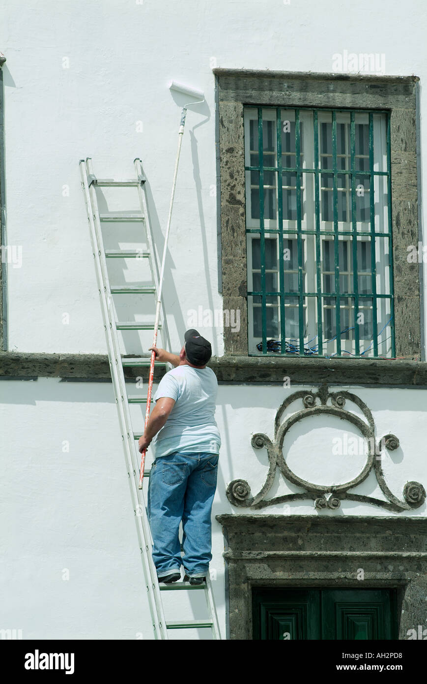 Painting house wall Stock Photo