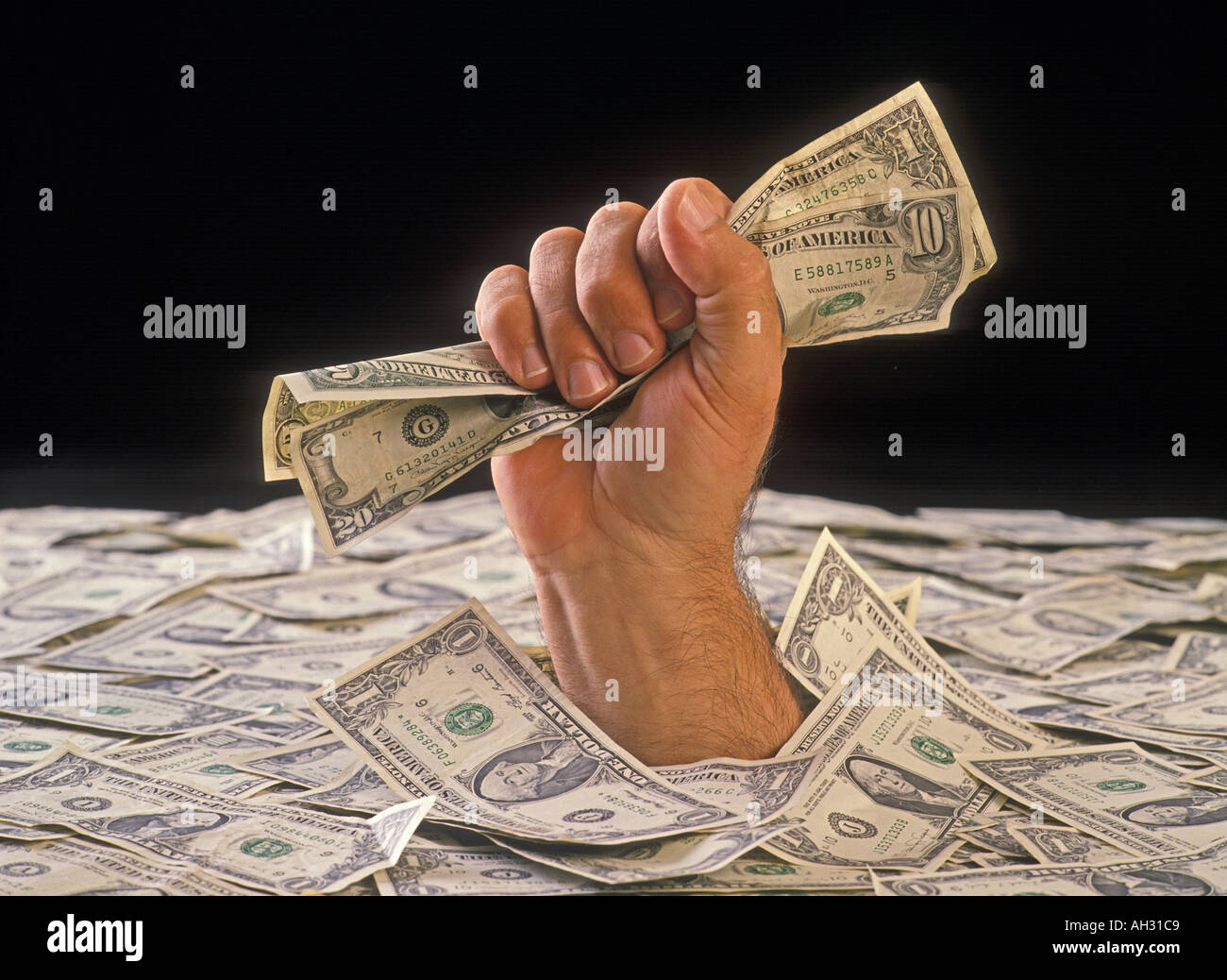 hand holding fistful of dollar bills USA Stock Photo Alamy