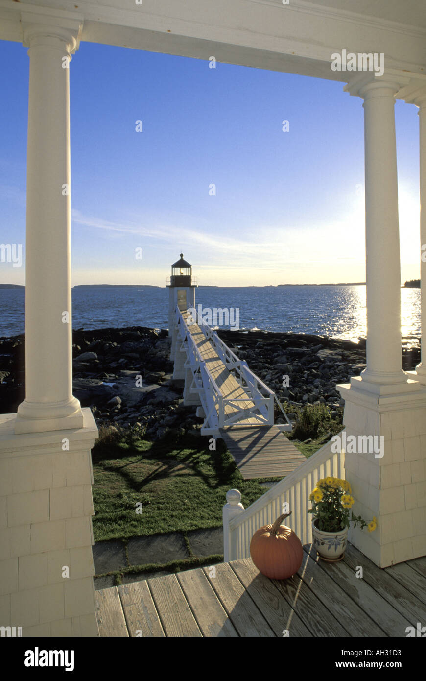 Marshall Point Light framed by porch columns of lightkeeper's house