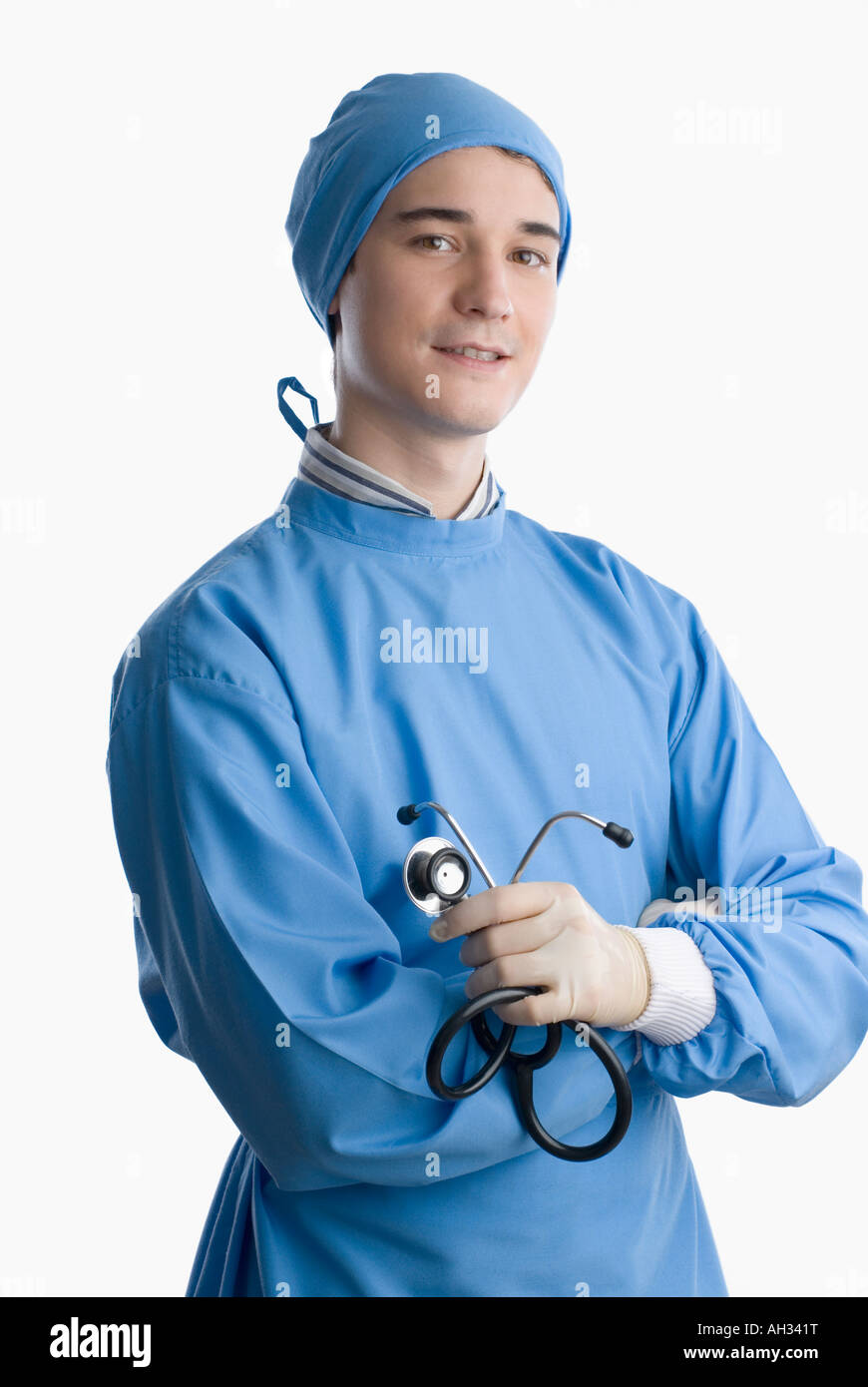 Portrait of a male surgeon holding a stethoscope and smiling Stock ...