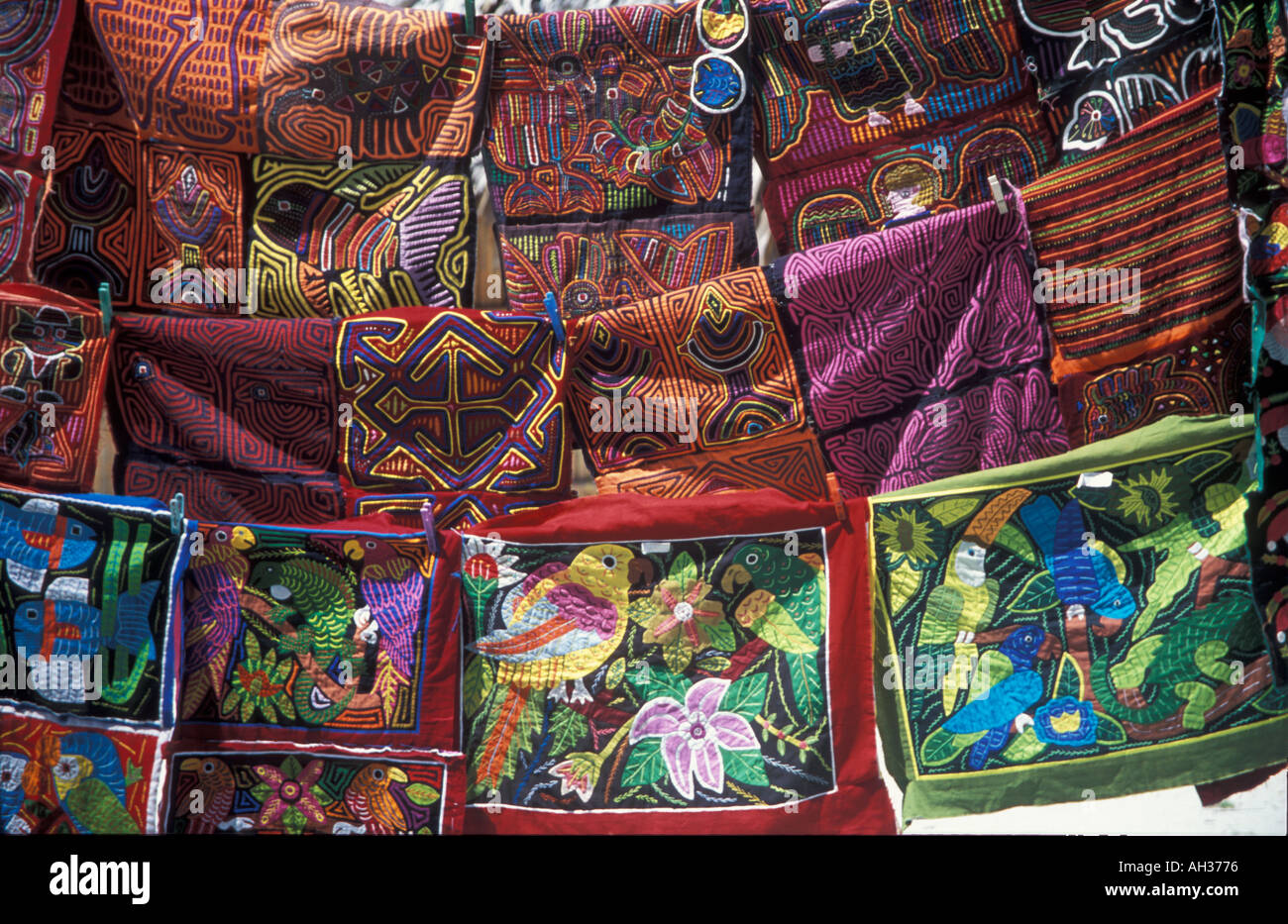 Colourful Molas a traditional blouse on display for sale on The San