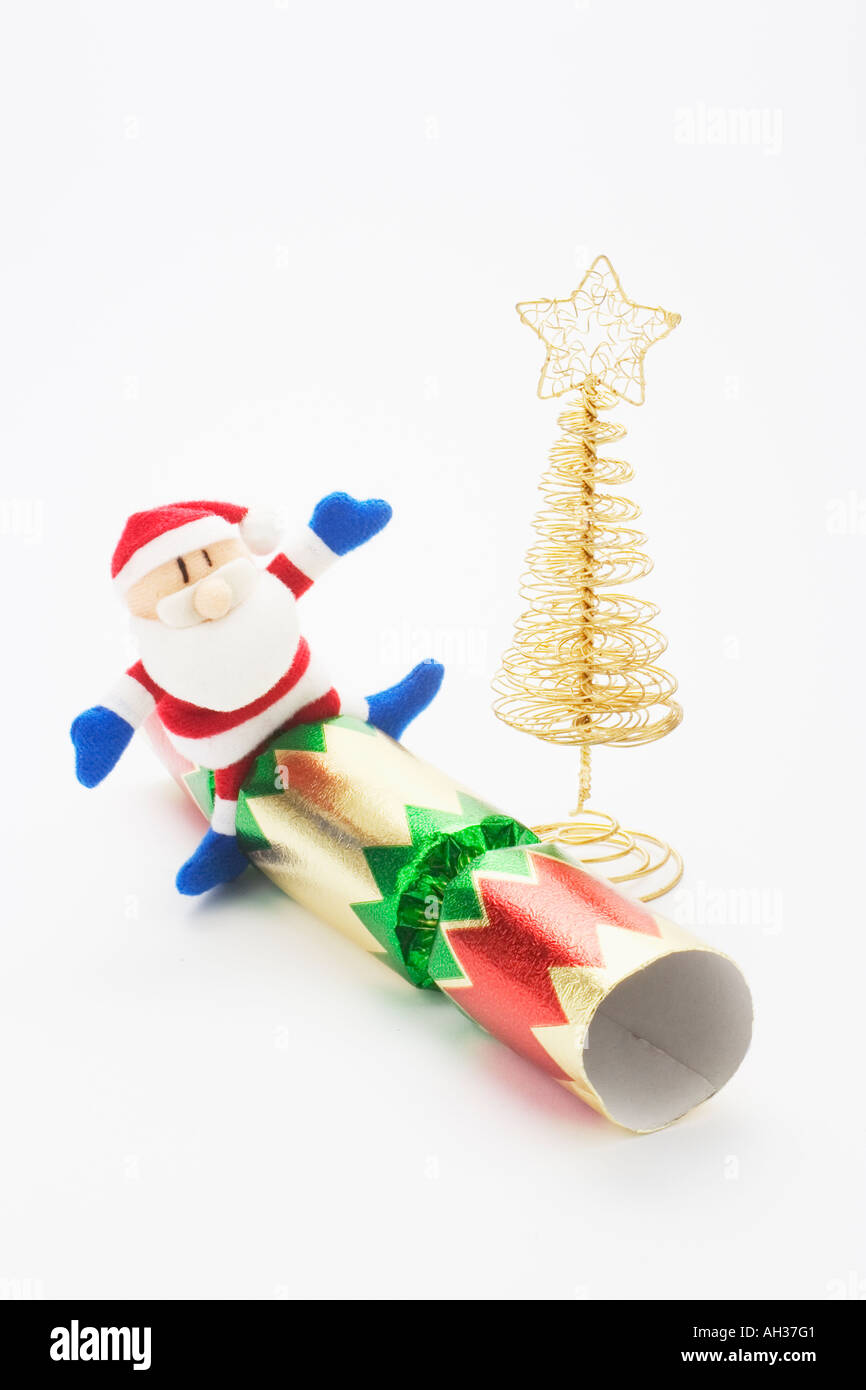 Santa Figure with Christmas Tree and Christmas Cracker Stock Image