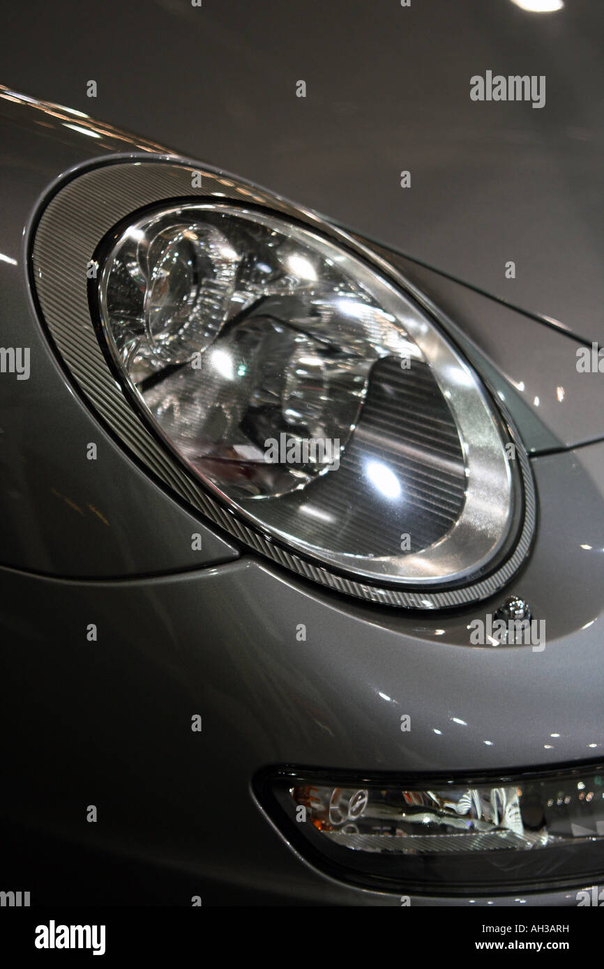 sports car front light detail from exhibition vertical Stock Photo Alamy