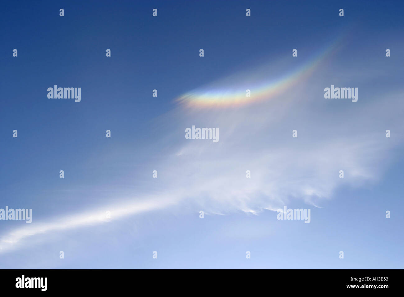 Sundog in cirrus cloud Stock Photo