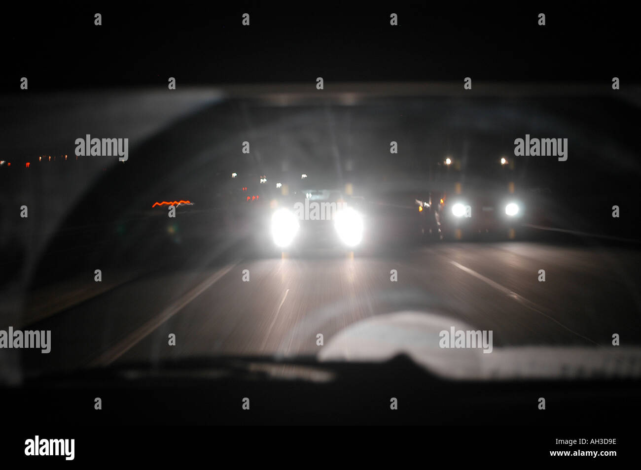 blinding car headlights at night uk Stock Photo Alamy