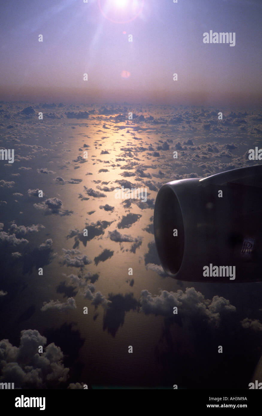 Sun over ocean flight to Hong Kong Stock Photo