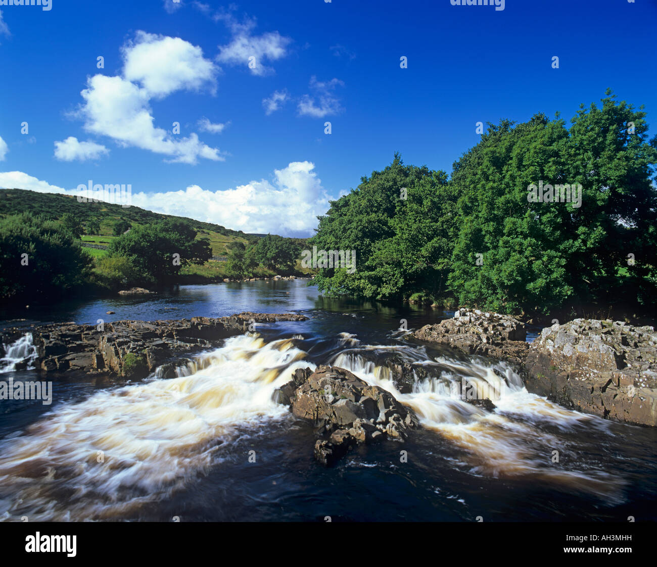 A waterfall on the River Tees between Low and High Force waterfalls in Teesdale, County Durham Stock Photo