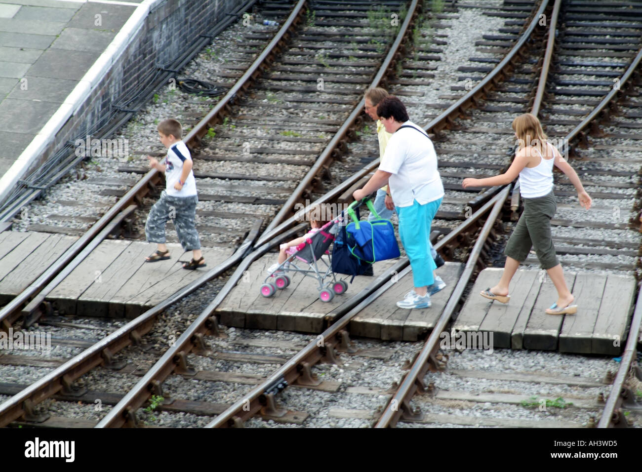 Woman railroad tracks woman crossing hi-res stock photography and ...