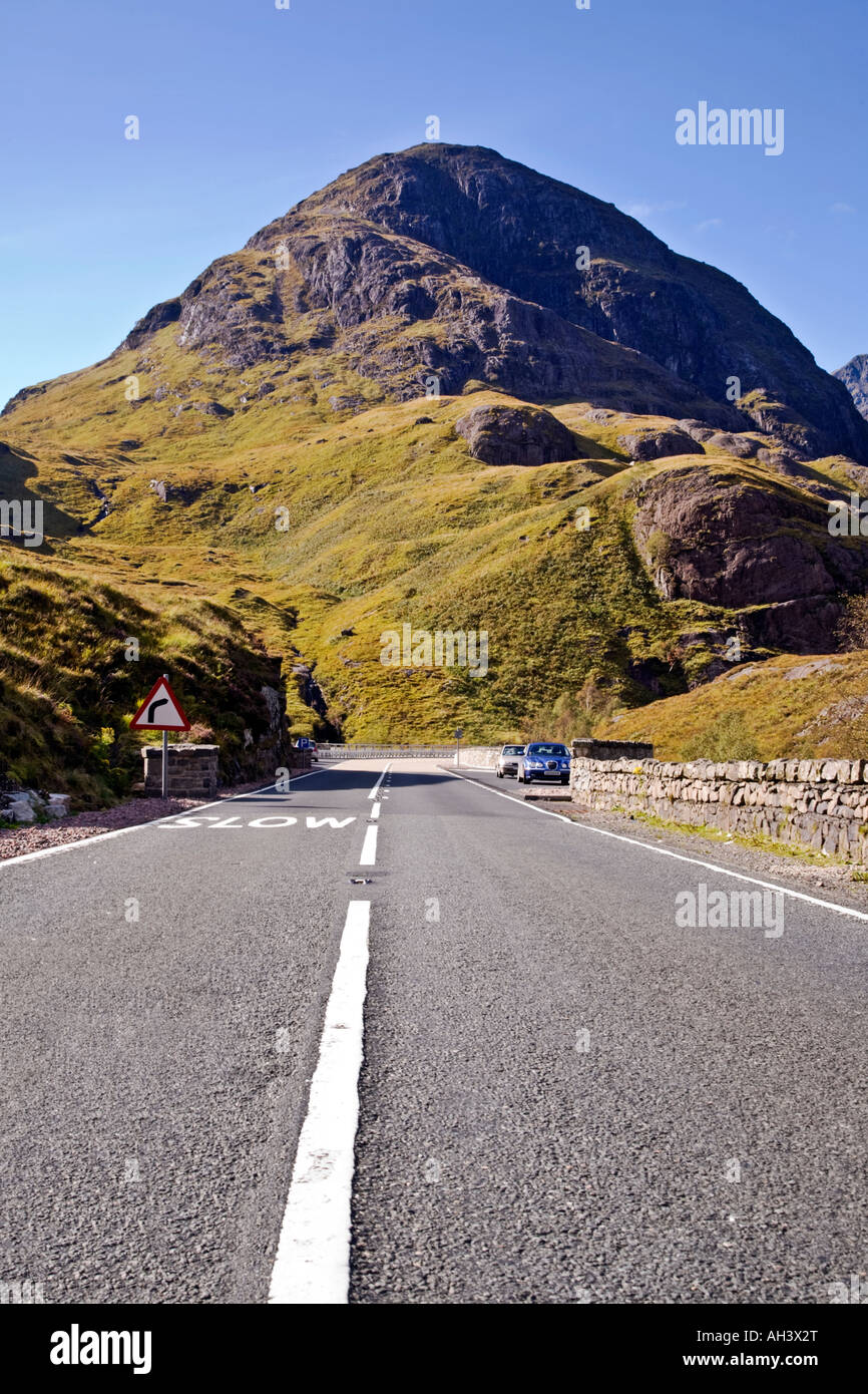The A82 road through the pass of Glen Coe and Beinn Fhada, Lochaber, Scotland. Stock Photo