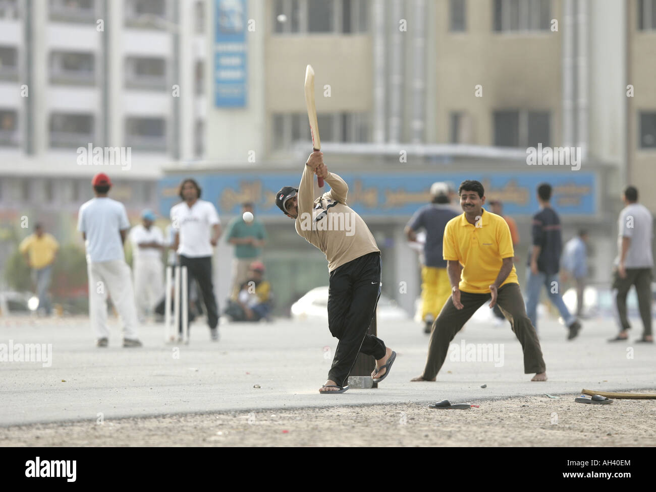Expatriates playing cricket in Dubai Stock Photo Alamy