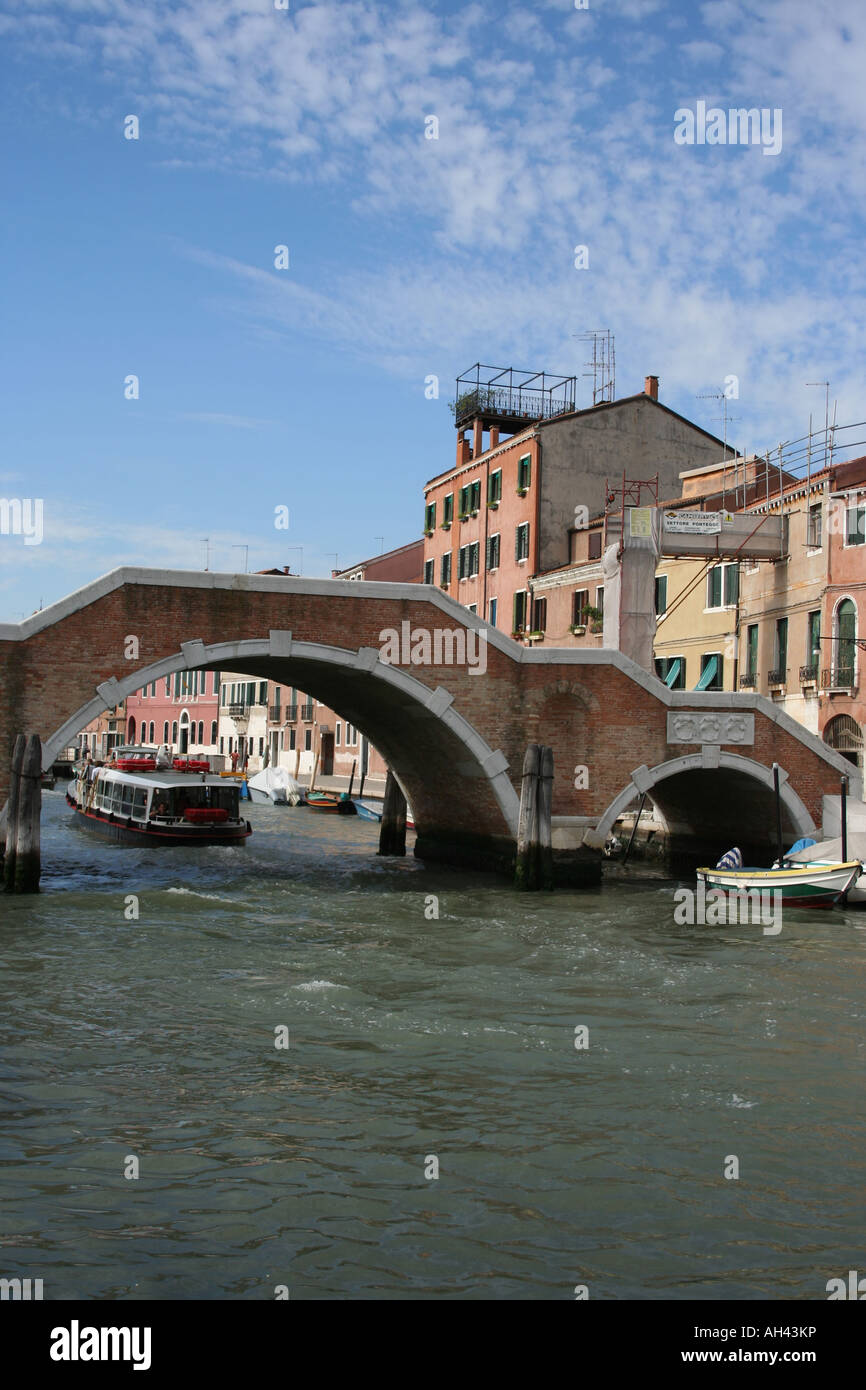 vaporetti and Ponte dei Tre Archi bridge of three arches over Cannaregio Canal, Venice Italy  September 2007 Stock Photo