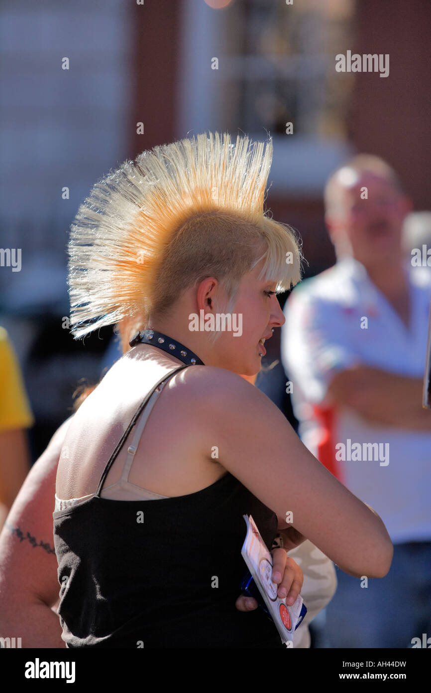 Covent Garden London centre of attraction Pretty girl with Mohawk hairdo Stock Photo