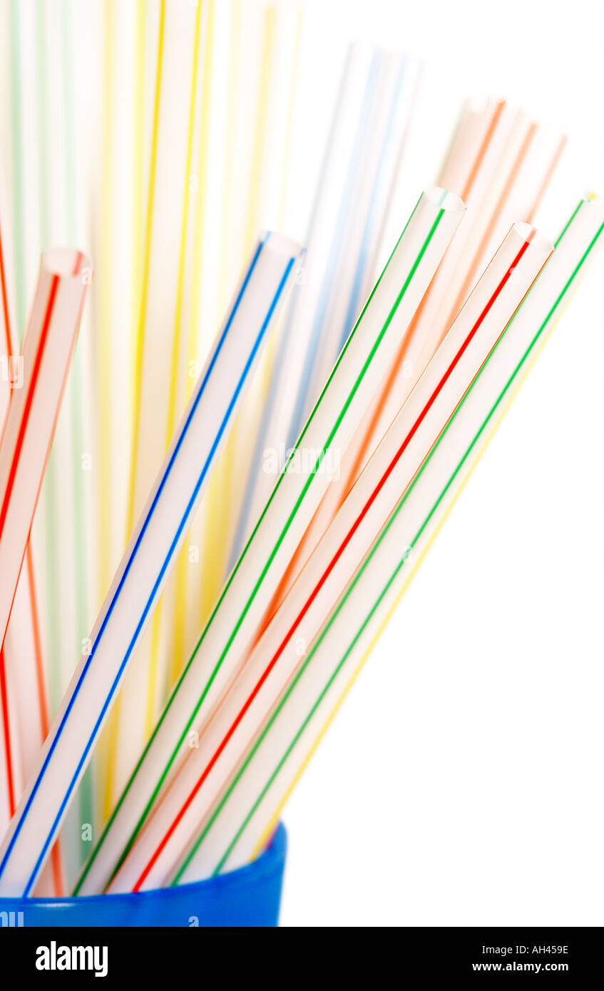 Close up of Single use non recyclable coloured plastic drinking straws